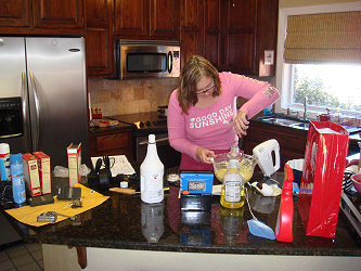 Susan in kitchen making a rum cake