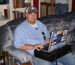 Wes working in the living room